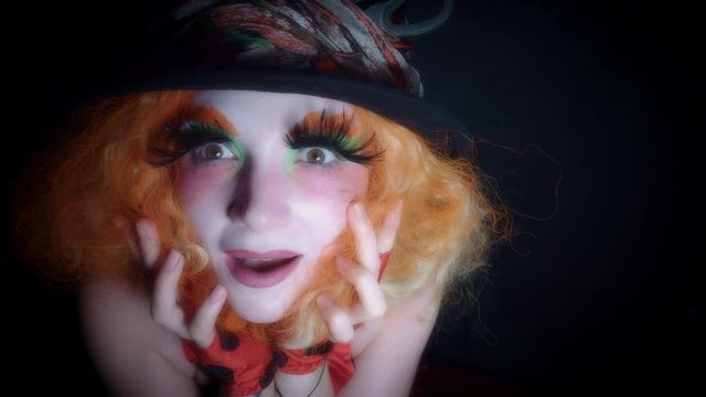 4k Woman Dressed up as Madhatter Posing Happy