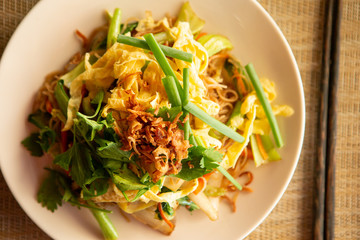 Fried noodle with table setting 