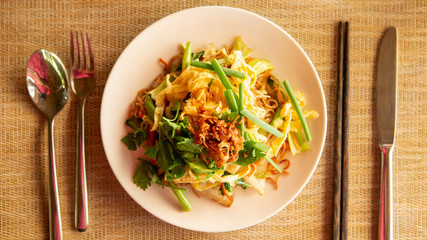 Fried noodle with table setting 