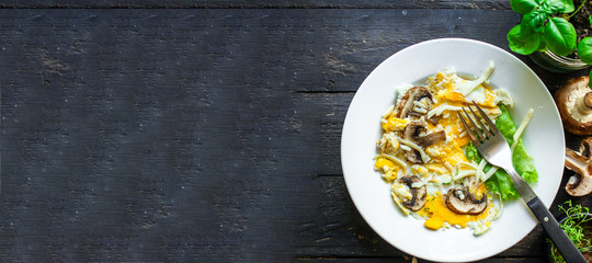 scramble fried eggs omelet with mushrooms Menu concept healthy eating. food background top view copy space for text keto or paleo organic product diet