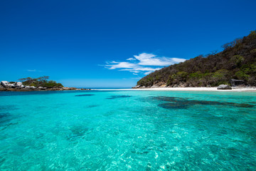 Fototapeta premium Racha Noi Island on a clear day with clear sea water during the high summer season,Phuket,Thailand.