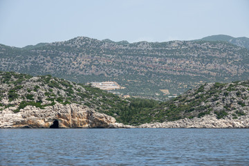 Fototapeta na wymiar View of the Turkish rocky coast near the island of Kekova