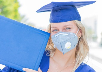 female graduate with a diploma,Covid
