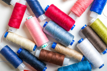 Multicolored sewing threads.