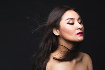 Portrait of young asian woman with makeup long hair.