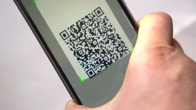 QR Code Scanning and reader app with smartphone. Using QR code for payment, commercial tracking, ticketing, product and loyalty marketing and in-store product labeling, exchanging information