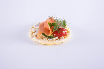 salmon tomato and dill on a corn waffle