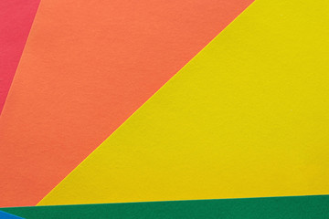 Abstract and colorful background of randomly arranged elements of red, orange, yellow, blue, green and purple