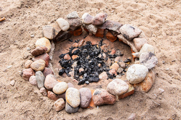 Place for a campfire on the shore of The Lake Saimaa, Huuhanranta beach, Ruokolahti, South Karelia, Finland