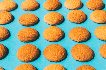 Tasty butter homemade cookies on a blue background.Sweet food concepts