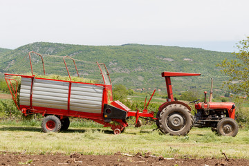 Tractor With Hay Collector in The Field