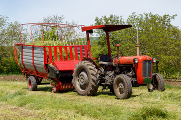 Tractor With Hay Collector in The Field