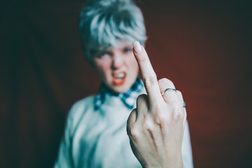 Portrait of a really angry androgynous woman