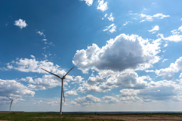 Wind turbines with beautiful clouds