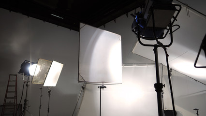 Studio light and back drop and soft box set up for shooting photo or video production which...