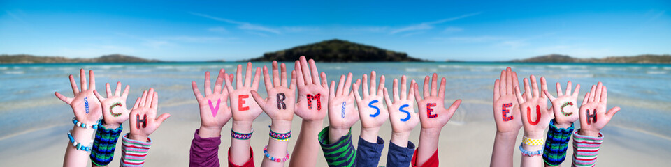 Children Hands Building Colorful German Word Ich Vermisse Euch Means I Miss You. Ocean And Beach As Background