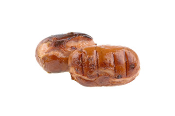 Two sausages fried on a barbecue on a white background, isolated.