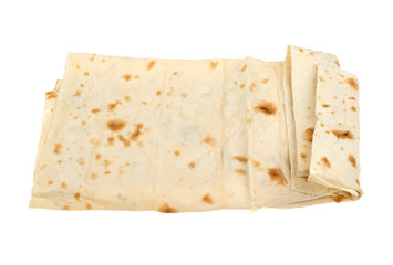 Thin pita bread on a white background, isolated.