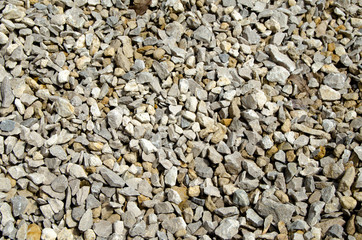 Texture of fine gravel photo in the sunshine