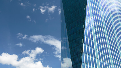 Reflection of the sky on the windows of a modern office building, London, England