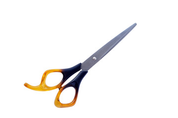 Pair of scissors with plastic handle isolated on white background