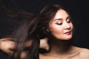 Fototapeta premium Portrait of young asian woman with makeup long hair.