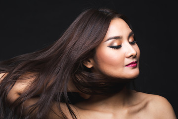 Fototapeta premium Portrait of young asian woman with makeup long hair.