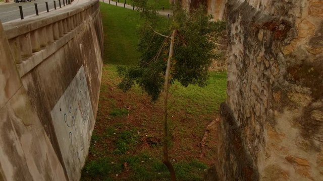 Establishing shot along the popular San Sebastian Aqueduct, also known as Garden Aqueduct, dating back to 1570 in Coimbra, Portugal