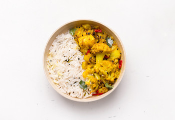 Aloo gobi indian vegetarian vegetable dish isolated on white background