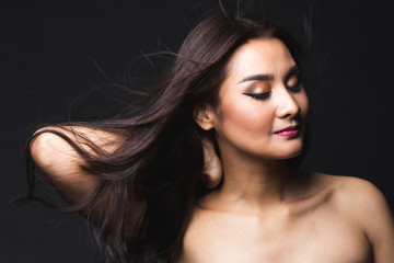 Portrait of young asian woman with makeup long hair.