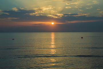Caspian Sea. Azerbaijan Baku Beautiful sunset in yellow as background. Azerbaijan nature . The sunset, the sea and the clouds.