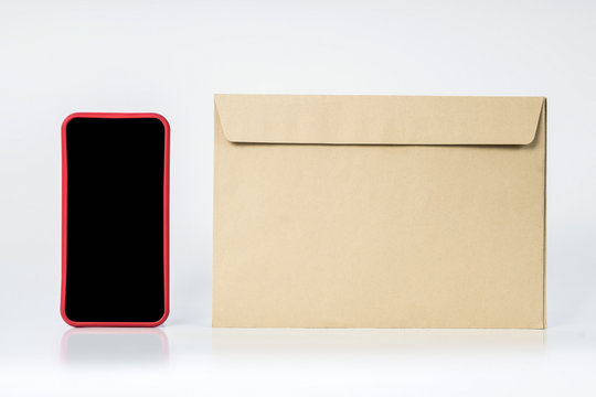 Close up picture of an envelope and a smartphone