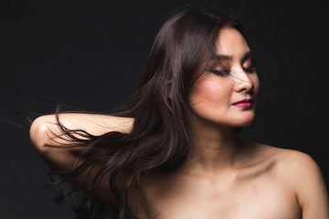 Portrait of young asian woman with makeup long hair.