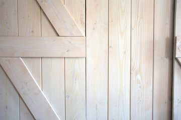 Light wood barn doors background texture modern interior close-up