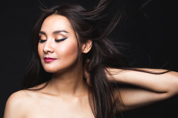 Portrait of young asian woman with makeup long hair.