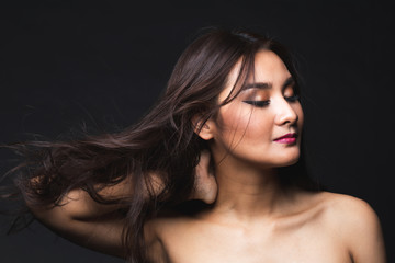 Fototapeta premium Portrait of young asian woman with makeup long hair.