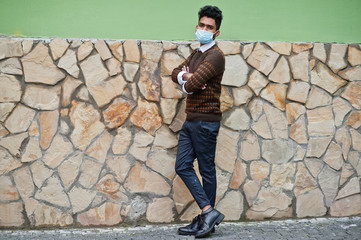 Coronavirus covid-19 concept. South asian indian man wearing mask for protect from corona virus.