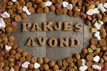 Pakjesavond means Presents evening. Dutch candy called Pepernoten eaten during Sinterklaas feast