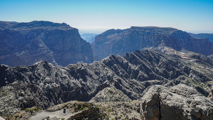 Fototapeta na wymiar Rocky Mountains at Jebel Akhdar Gorge in Al Hajar Range, Oman