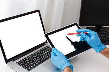 Business woman holding blank touch screen device.