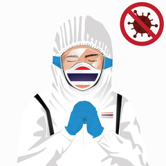 Covid-19 or Coronavirus concept. Thai medical staff wearing mask in protective clothing and praying for against Covid-19 virus outbreak in Thailand. Thai man and Thailand flag. Epidemic corona virus