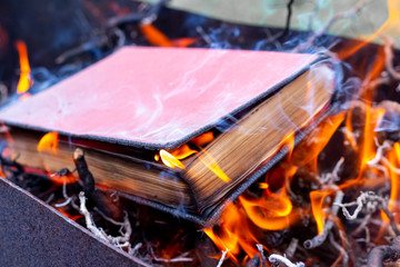 Burning book. The book is burning on the fire