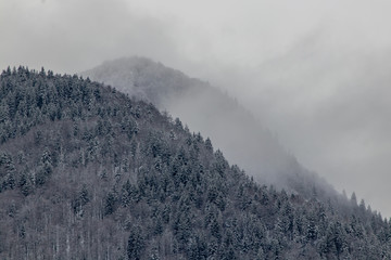 Clouds covering snowy hills, Bohinj valley