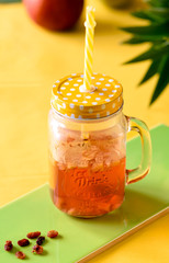 Iced tea with tropical fruits
