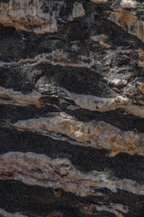 Rough Uneven Surface Texture of Wadi Ghul aka Grand Canyon of Oman in Jebel Shams Mountains. Vertical Photo