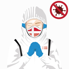 Covid-19 or Coronavirus concept. Danish medical staff wearing mask in protective clothing and praying for against Covid-19 virus outbreak in Denmark. Danish man and Denmark flag. Pandemic corona virus