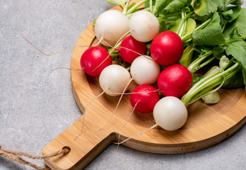 Fresh washed white and red radish vegetables ready to eat