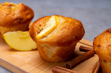 Fresh baked muffins with apple and cinnamon close up