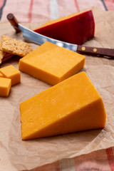 Matured yellow cheddar cheese close up
