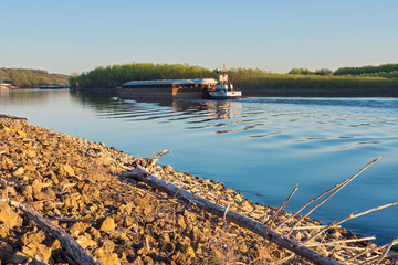 Towboat pushes river barge in south saint paul